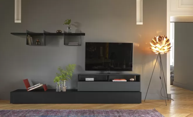 Meuble TV Adulis noir avec rangement et étagères en métal