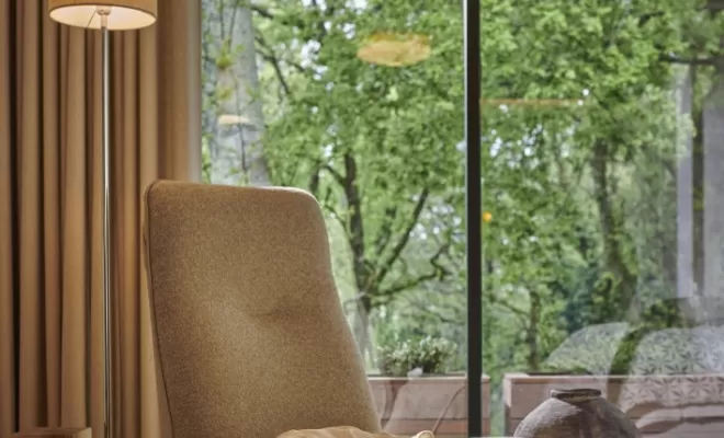 Fauteuil SWING en tissu Luando Rock et passepoil en Lario rock