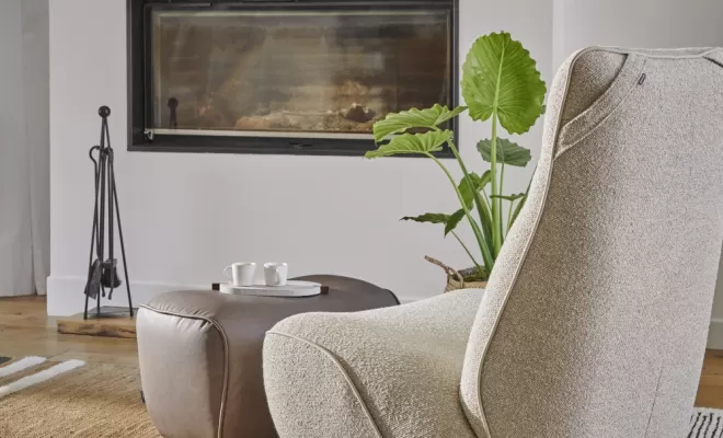 Fauteuil swing en tissu disposant d'une fonction bascule avec pouf assorti