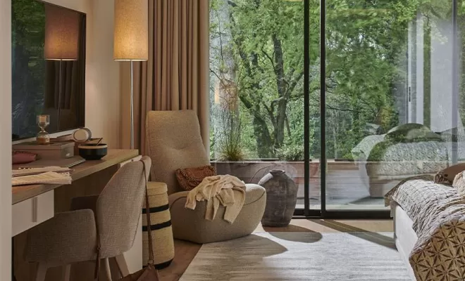 Fauteuil SWING en tissu Luando Rock et passepoil en Lario rock